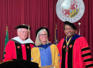 ann smith with Kirwan and Pres pines at ceremony